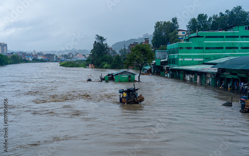  Bagmati River flooded and affected the riverbanks and homes during heavy rainfall in Kathmandu, Nepal. photo