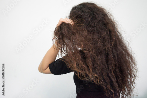 woman with long hair and damaged hair problems