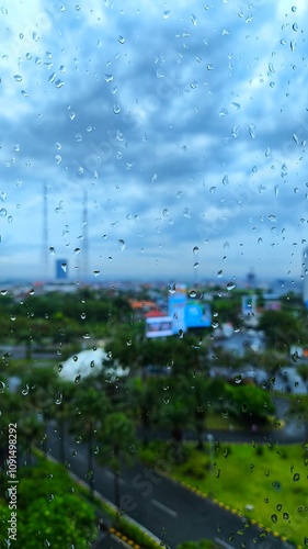 close up of window glass with raindrops