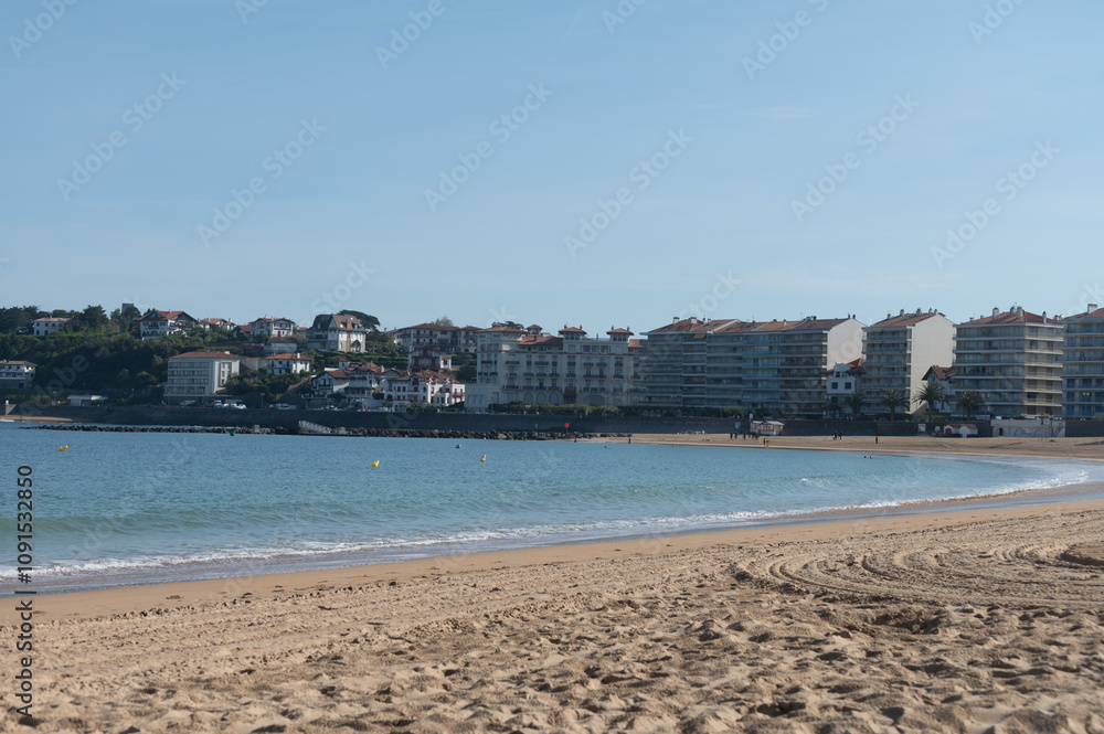Beach, houses of Saint Jean de Luz on Basque coast, famous resort, known for beautiful architecture, nature and cuisine, South of France, Basque Country Beach, houses of Saint Jean de Luz on Basque coast, famous resort, known for beautiful architecture, nature and cuisine, South of France, Basque Country