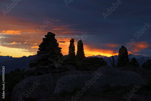 Mystischer Kraftort in den Bergen mit kultischen  Steinmännern - mystic power place with holy cairns in the mountains photo