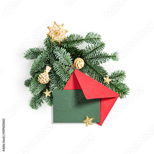 Christmas card, envelope and fir branch photography isolated on white background. photo