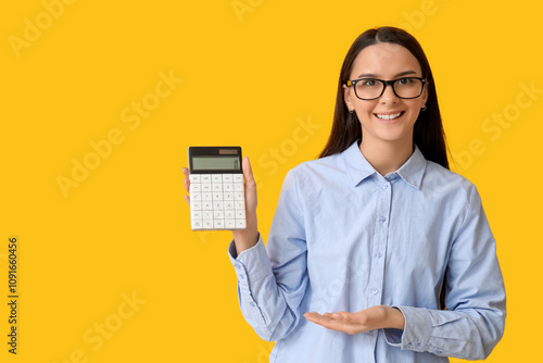 Smiling young woman in glas...