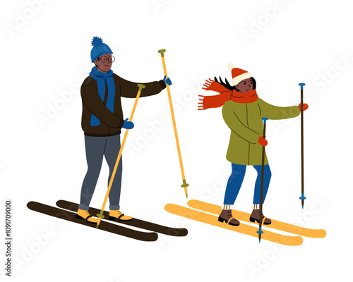 Winter outdoor activity featuring two individuals skiing on a snowy trail