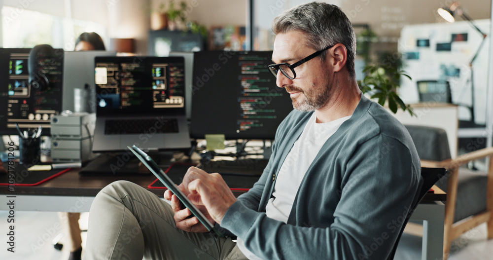 © peopleimages.com - Code, business man and engineer on tablet for software development, scroll or update database. Programmer, digital technology or mature manager design game, website or app in creative startup office © peopleimages.com - Code, business man and engineer on tablet for software development, scroll or update database. Programmer, digital technology or mature manager design game, website or app in creative startup office