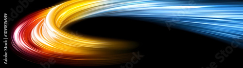 Vibrant light streaks swirl dynamically in an orange, blue, and yellow circular wave against a stark black backdrop photo