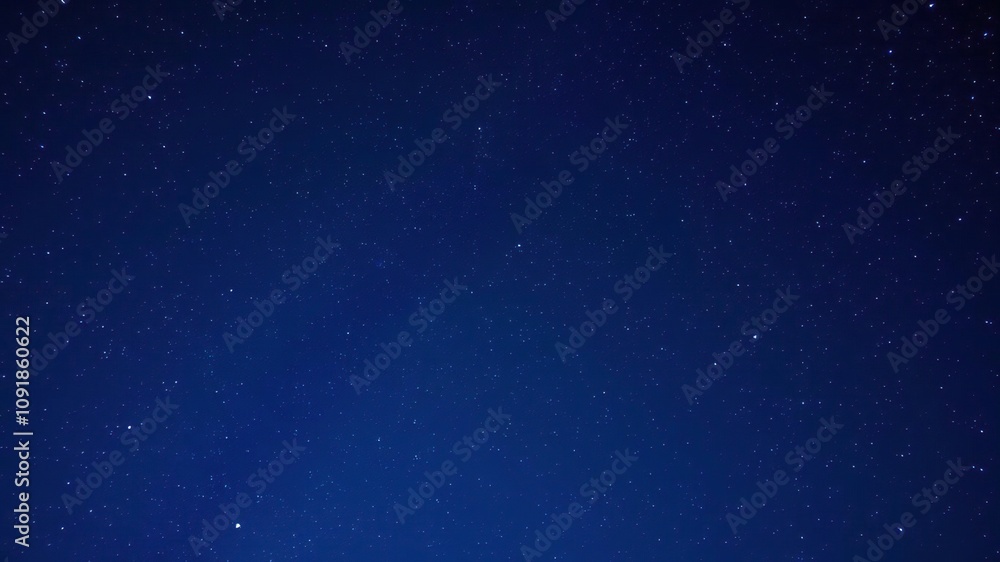 Naklejka premium The night sky filled with countless stars and constellations in shades of blue and purple, cosmos, dark blue