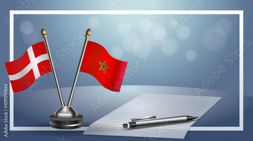 Denmark and Morocco National flags on small table with bokeh background, cooperative relationship