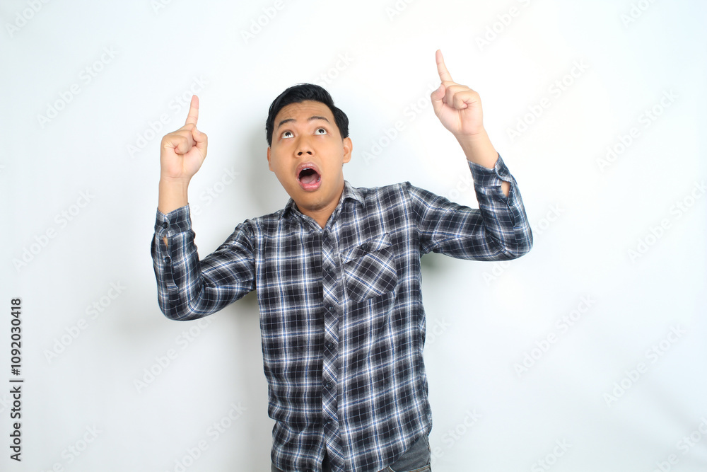 shocked asian man pointing finger with scared face isolated on white wearing casual shirt shocked asian man pointing finger with scared face isolated on white wearing casual shirt