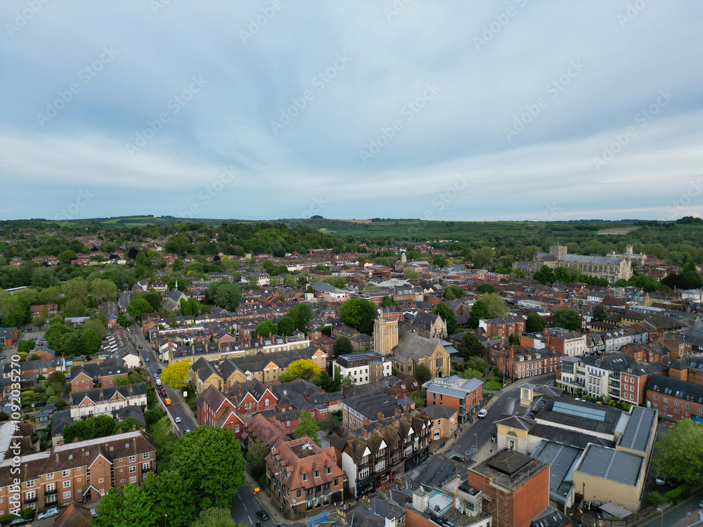 Obraz premium High Angle View of British Historical City of Winchester Central During Sunset, England United Kingdom, Aerial Footage Was Captured with Drone's Camera From Medium High Altitude on May 17th, 2024