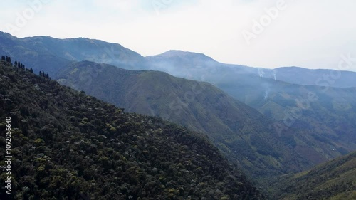 Aerial over green lush landscape, mountain range between Guaranda and Montalvo, Bolivar Province, Ecuador photo