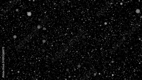 Snowflakes fall from the sky on a winter night. shot of flying snowflakes in the air with black background. 4k video	
Category	
Science	
