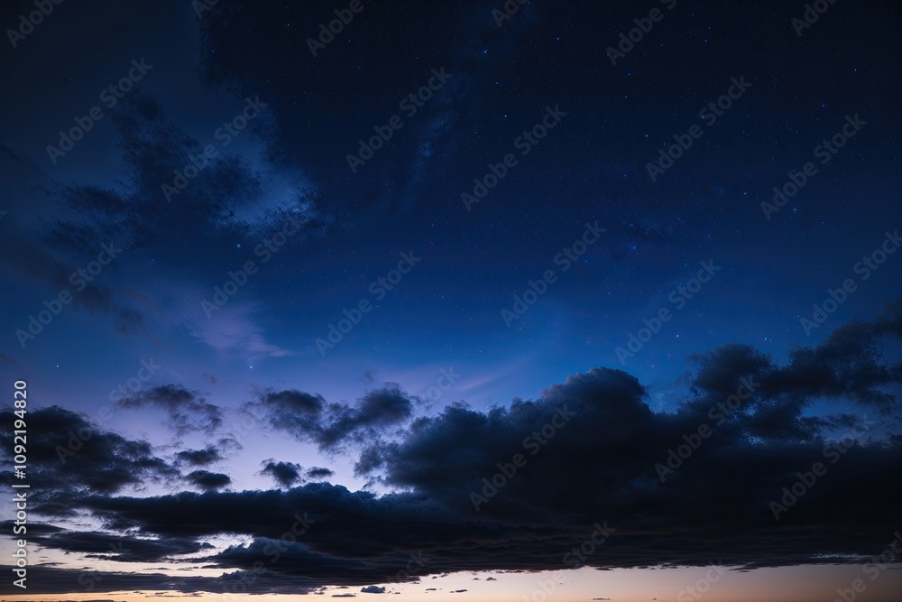 Fototapeta premium Indigo Clouds Enveloping a Peaceful Night Sky