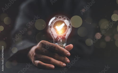 AI workflow optimization concept, Businesswoman holding light bulb with automation icon on virtual screen. Workflow optimization of business and industrial processes, Automation, software development.