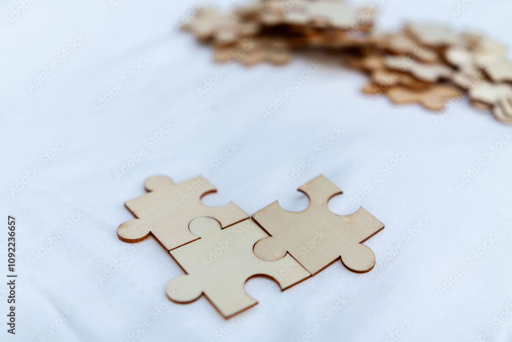 Fototapeta premium Strategic business solutions office workspace puzzle pieces minimalist environment close-up view problem-solving concept