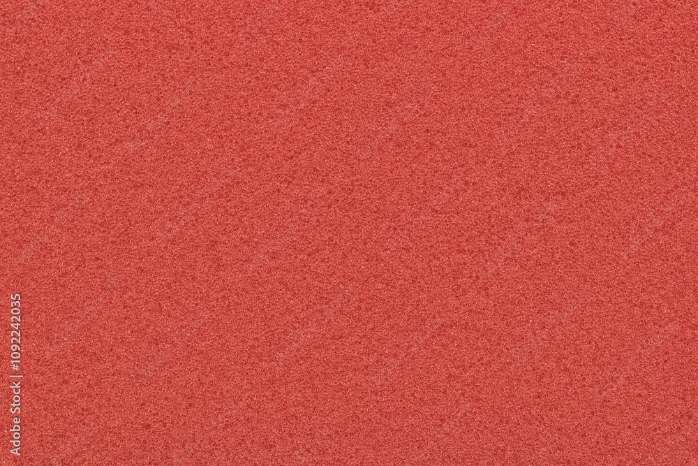 Fototapeta premium Watermelon pink foam background one color porous sponge packing material. 
