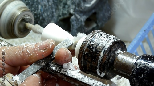 Canvas-taulu Crafting Art from Earth: The Meticulous Process of Shaping Eskişehir’s Meerschaum Stone into a Unique Pipe, Symbolizing the Transformation of Raw Material into Timeless Art