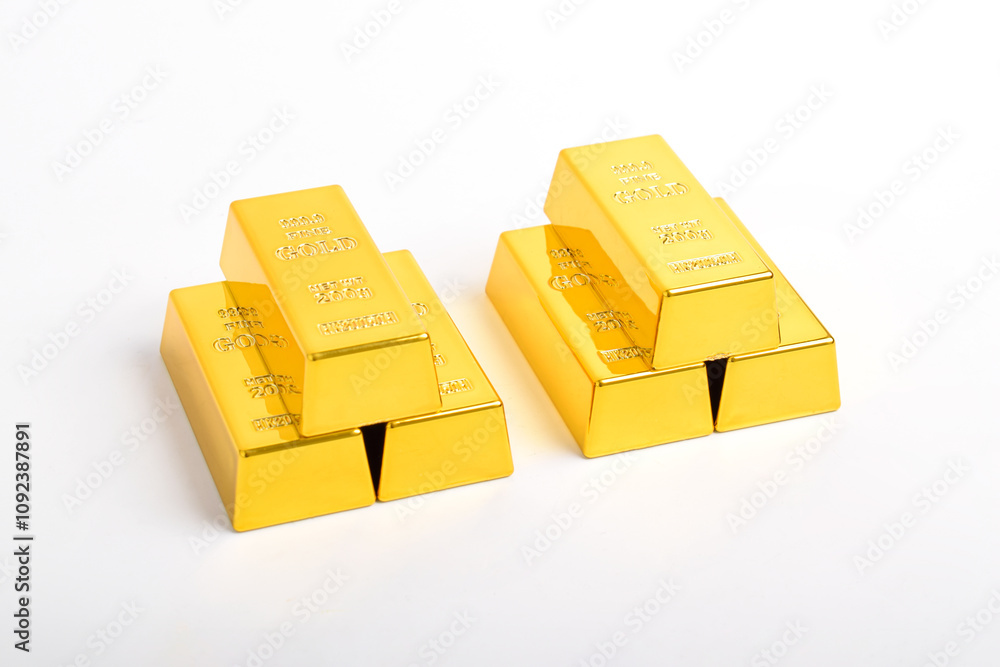 Stack of shiny gold bars isolated on white background Stack of shiny gold bars isolated on white background