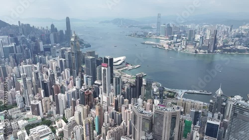 Aerial drone skyview of Hong Kong West Kowloon Victoria Harbour Financial Tsim Sha Tsui Hung Hom Central Admiralty Wan Chai Happy Valley Causeway Bay  photo