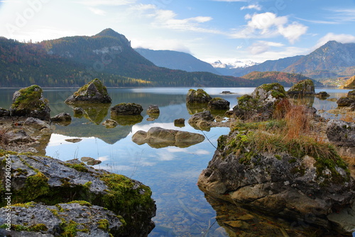 Obraz na płótnie Colorful Autumn scenery and reflections on the lake Altausseer See, Bad Aussee, Salzkammergut, Styria, Austria, Europe, with the mountains and the Dachstein in the background w salonie