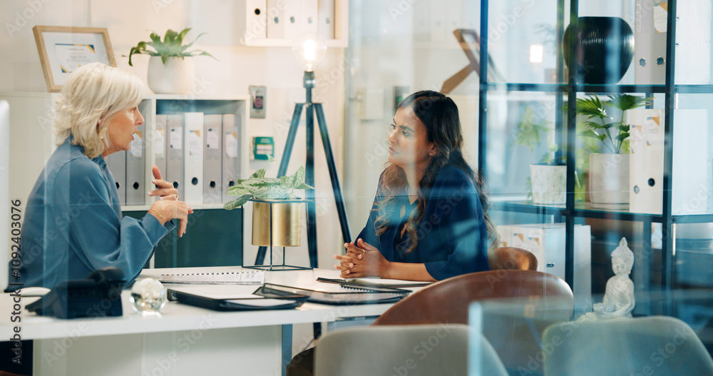 © peopleimages.com - Discussion, business or women in meeting with legal advisor for court case, documents or research. People, glass window or lawyer with attorney, paperwork or portfolio at law firm for feedback review