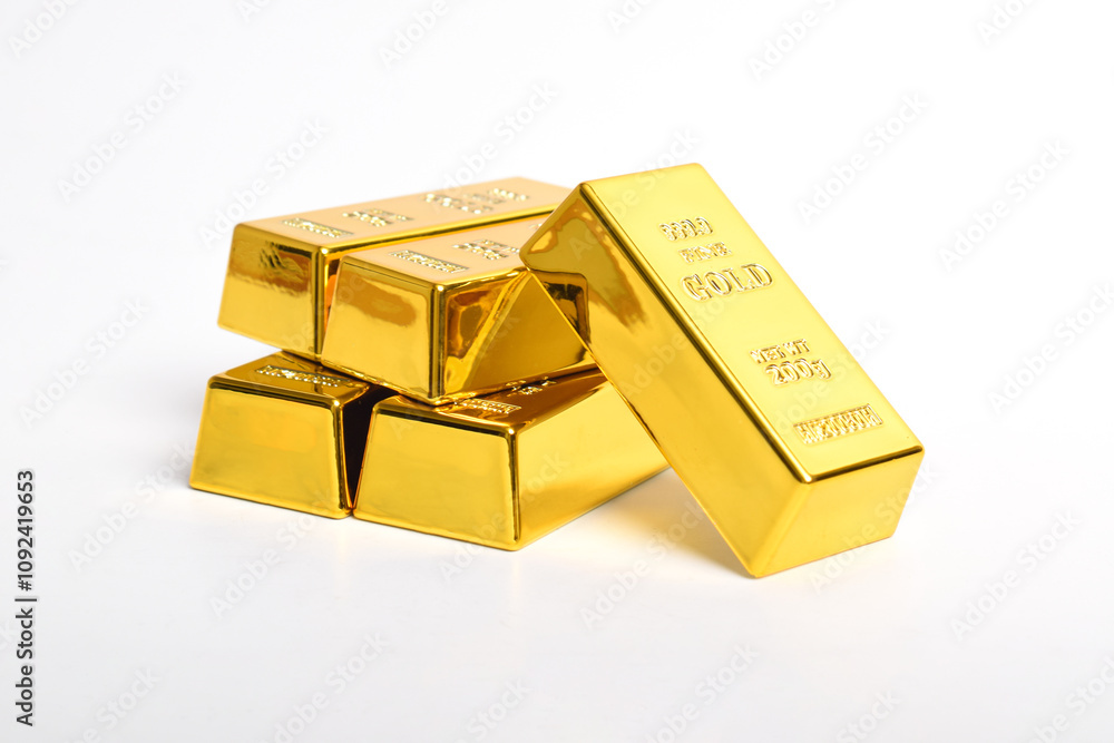 Many shiny gold bars isolated on white background Many shiny gold bars isolated on white background
