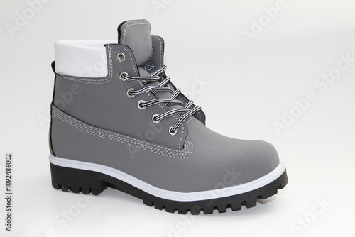 Women's boots. Short-throated. On a white background. Side view.