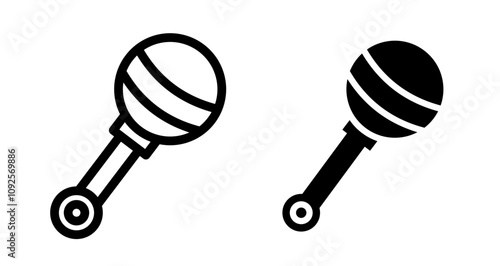 Baby rattle Icon set in black filled and line.