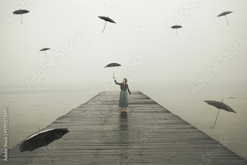 woman with umbrella walking on a pier surrounded by flying umbrellas, abstract concept photo