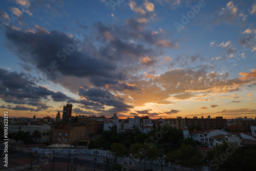 sunset clouds over the evening city