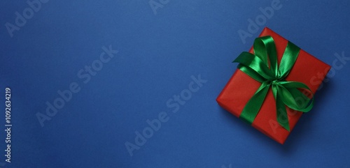 Konstfotografi Beautiful gift box on color background