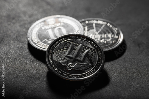 Ukrainian 10 hryvnias coins. New Ukrainian 10 hryvnia coins Special Operations Forces of Ukraine Armed Forces. photo