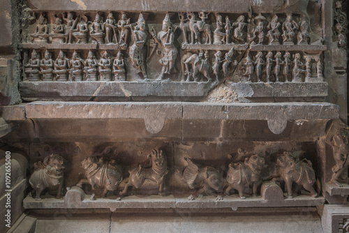 An ancient stone sculpture at Bhuleshwar temple, 13th century hindu temple of Lord Shiva, carved in black basalt stone, built by Panch Pandava, Pune, Maharashtra, India, Asia. photo