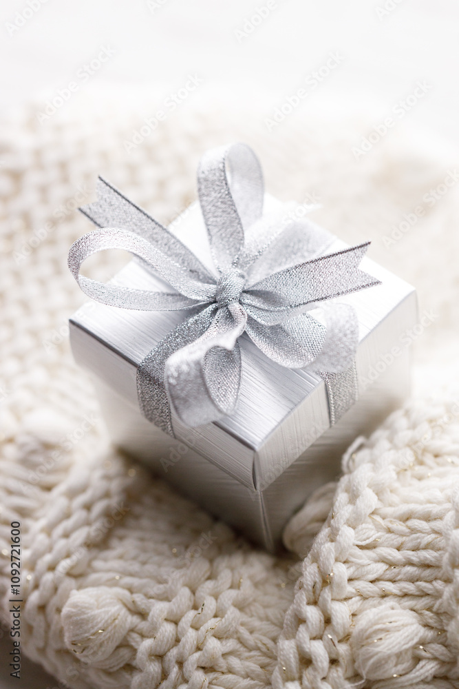 Artisan gift box on soft sweater Artisan gift box on soft sweater