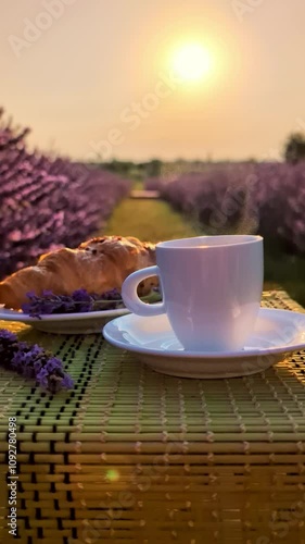 Morning Coffee and Croissant in Lavender Field. Vertical Video