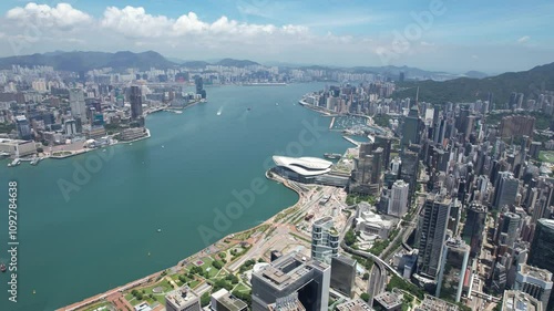 Aerial drone skyview of Hong Kong West Kowloon Victoria Harbour Financial Tsim Sha Tsui Hung Hom Central Admiralty Wan Chai Happy Valley Tai Hang Causeway Bay Tai Hang
 photo