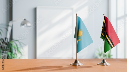 FLAGS OF KAZAKHASTAN AND VANUATU ON TABLE photo