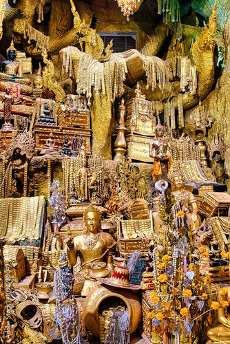 Photos Amazing treasure cave with golden jewelry, treasure chests, pearls, dragons and statues in a Thai buddhist temple