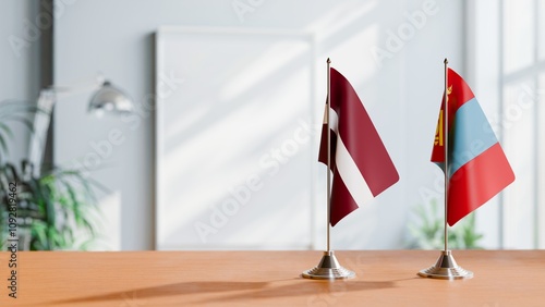 FLAGS OF LATVIA AND MONGOLIA ON TABLE photo