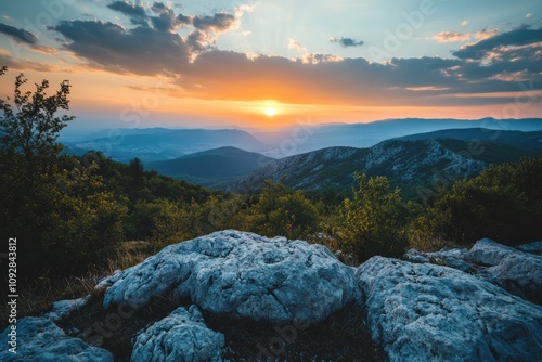 A rocky landscape at sunset, shot with a 21mm lens. A view with rocks and hills. photo