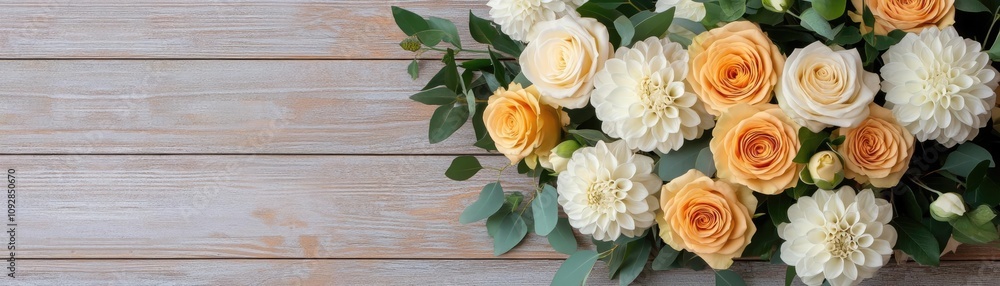 Fototapeta premium Floral bouquet in Chardonnay hues, golden roses, cream dahlias, subtle green leaves, rustic setting