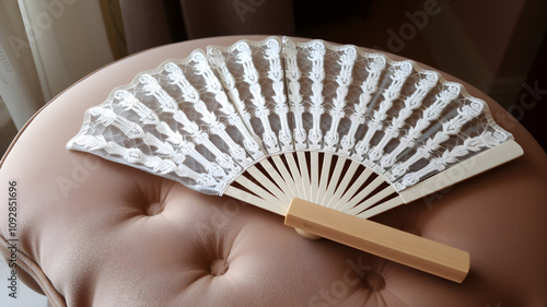 A retro handheld fan with delicate lace detailing, resting on a velvet cushion. Generative AI photo