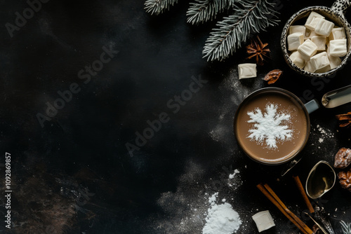 A cozy flat lay of hot chocolate topped with a snowflake design, surrounded by marshmallows, spices, and frosted fir branches on a dark rustic surface. photo