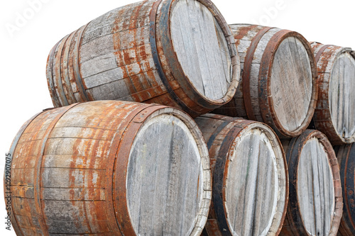 Old wooden barrels on a white