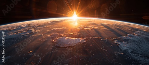 Wide shot of the Earth from space, the sun is rising over it with dramatic lighting. photo