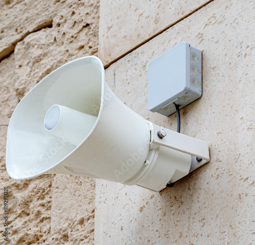 Public address system loudspeaker on the wall