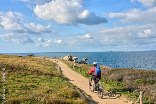 active senior woman cycling...