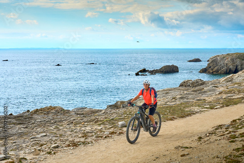 active senior woman cycling...