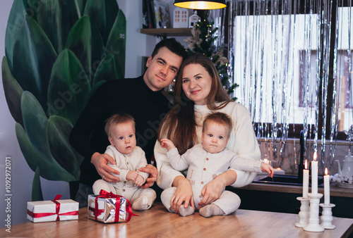 family with twin children in the kitchen