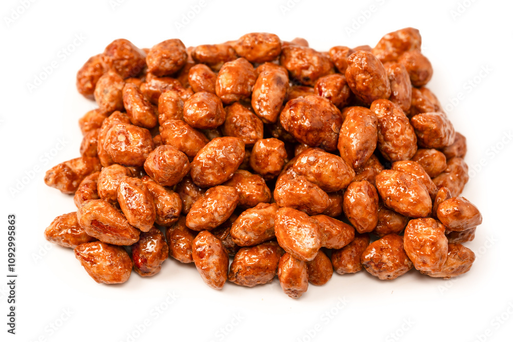 Tasty sweet roasted peanuts isolated on a white background. Tasty sweet roasted peanuts isolated on a white background.